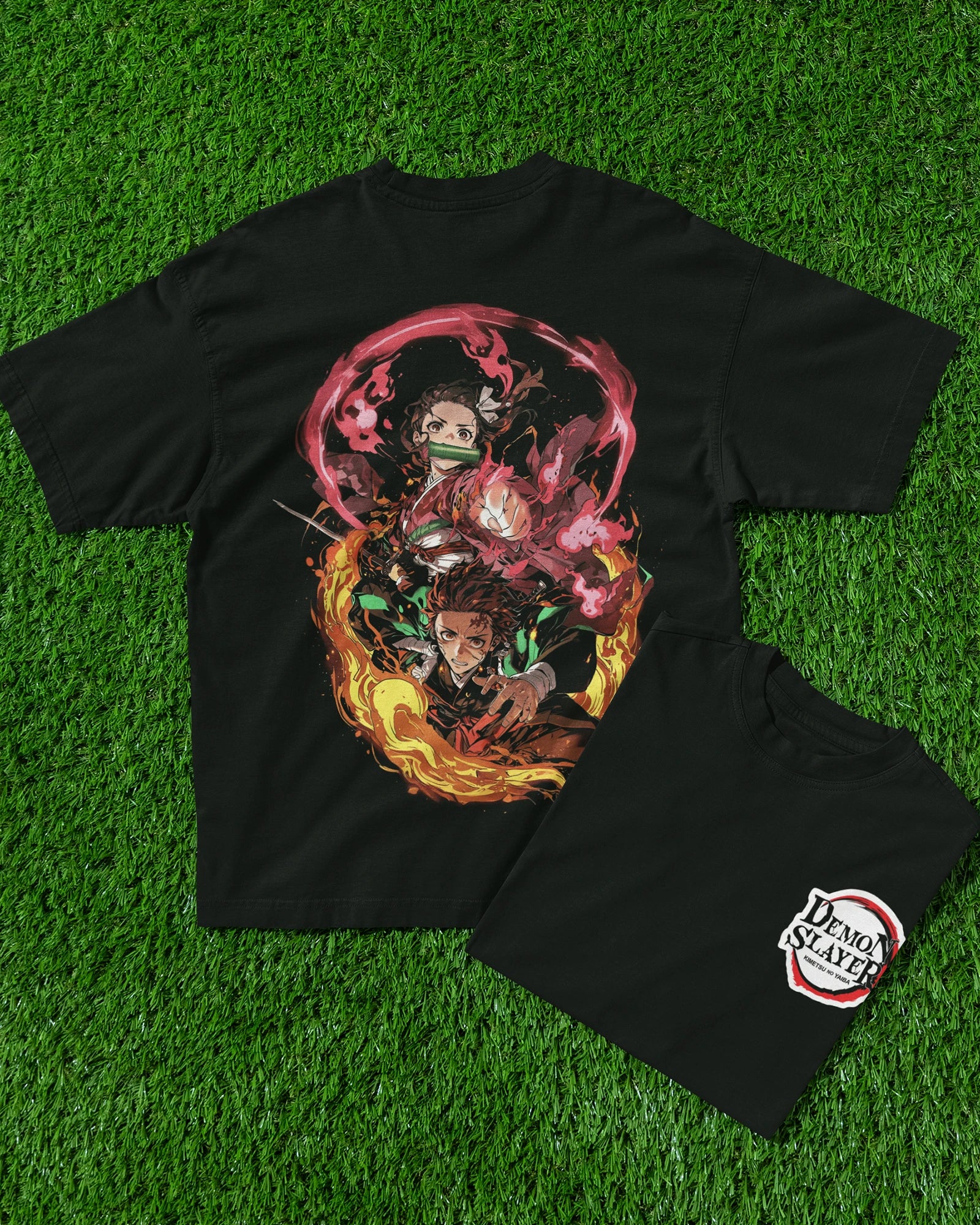 Model wearing black oversized Demon Slayer t-shirt featuring Tanjiro and Nezuko designs, made from 240 GSM cotton.