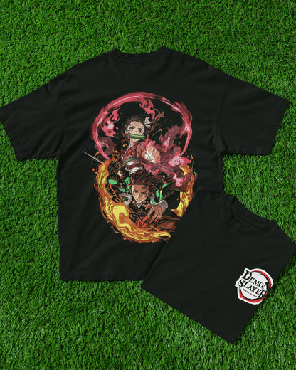 Model wearing black oversized Demon Slayer t-shirt featuring Tanjiro and Nezuko designs, made from 240 GSM cotton.