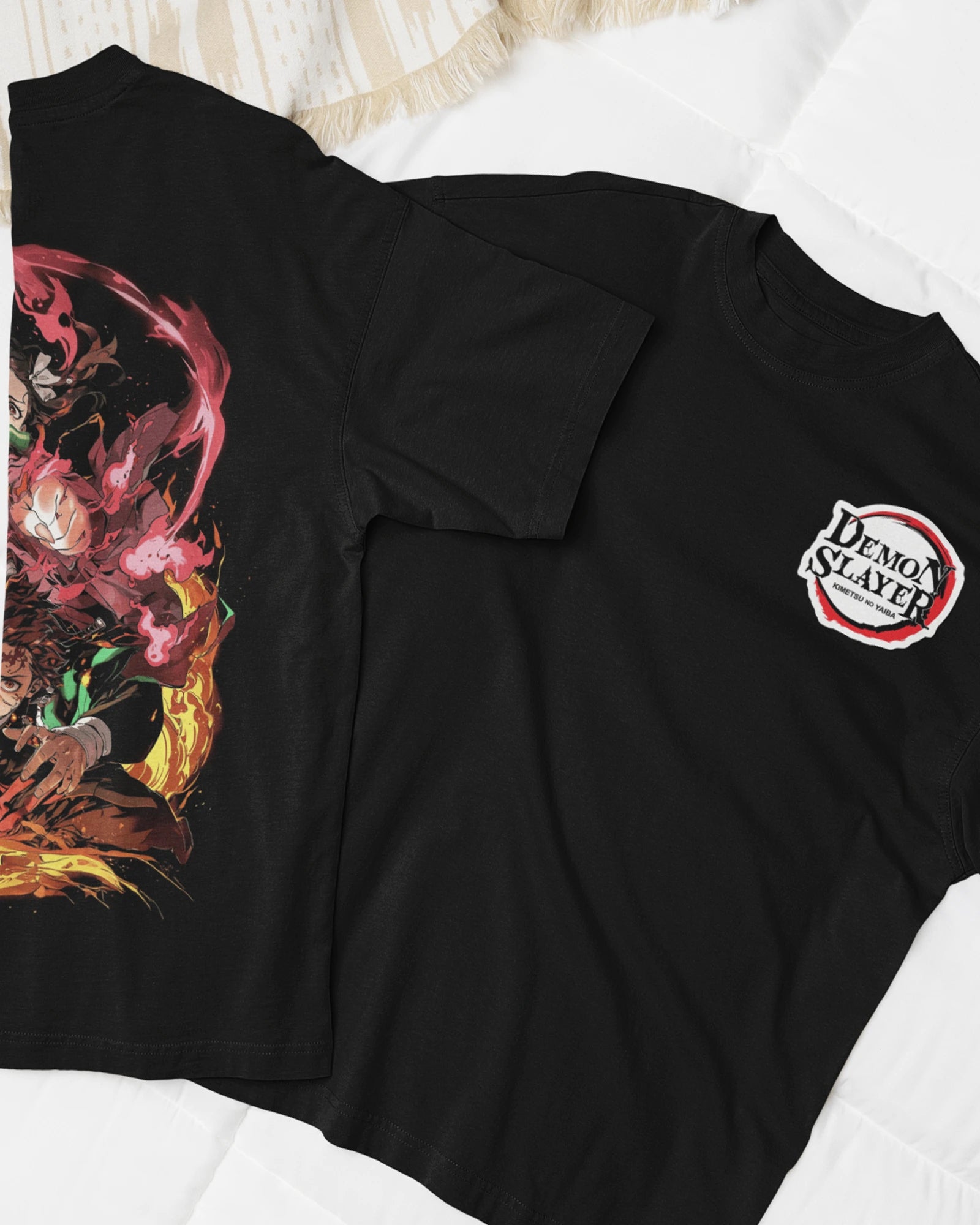 Model wearing black oversized Demon Slayer t-shirt featuring Tanjiro and Nezuko designs, made from 240 GSM cotton.