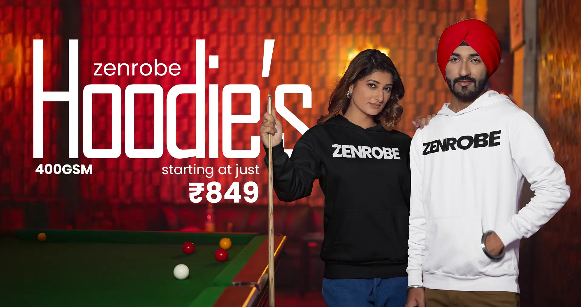 A man wearing a white Zenrobe t-shirt with the print 